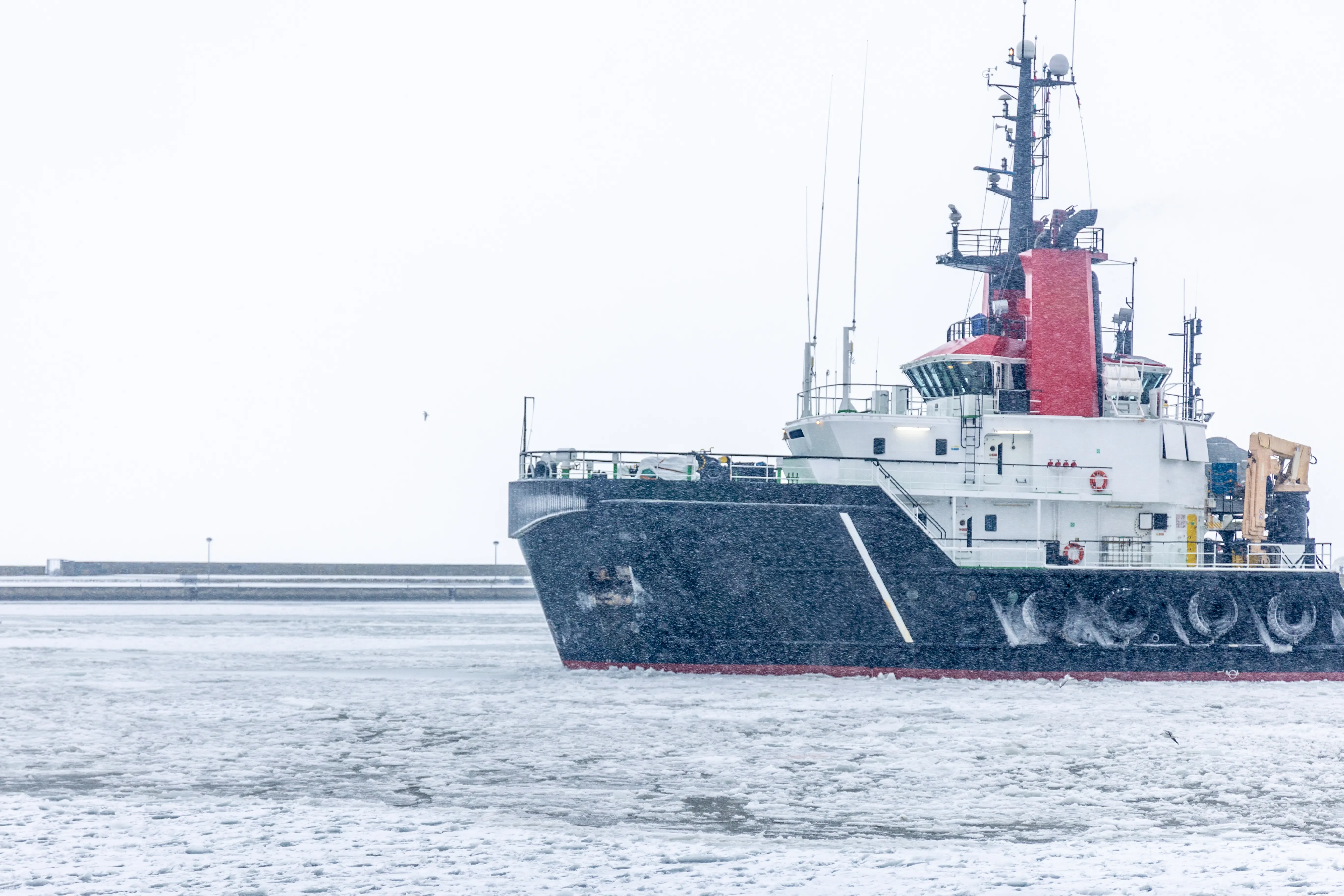 Work vessel in harbor
